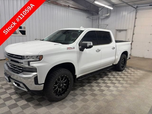 2021 Chevrolet Silverado 1500 LTZ in Summit White — front three-quarter view