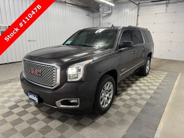 2017 GMC Yukon XL Denali in Iridium Metallic — front three-quarter view
