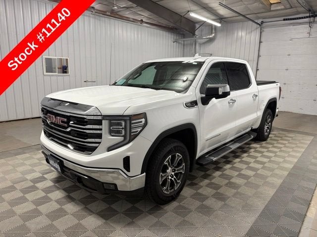 2026 GMC Sierra 1500 SLT in Summit White — front three-quarter view