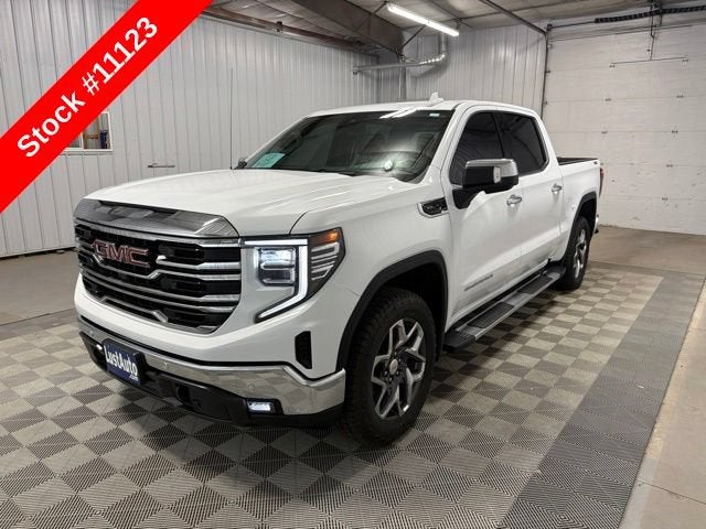 2025 GMC Sierra 1500 SLT in Summit White — front three-quarter view